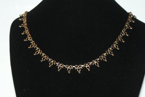Unique necklace. 14 karat gold