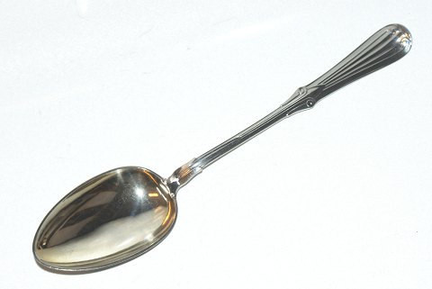 Silver serving spoon, Stamped year 1883
Length 25.7 cm.
Engraving A.T