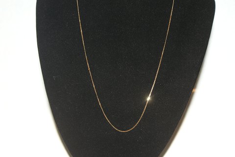Armored faceted necklace in 14 carat gold