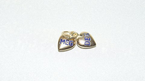 Elegant pendant / charms hearts with writing (me and you) in 14 carat gold