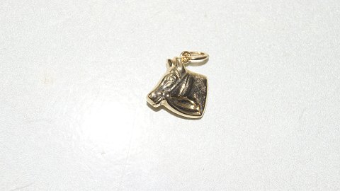 Elegant pendant / charms Horse head in 14 carat gold