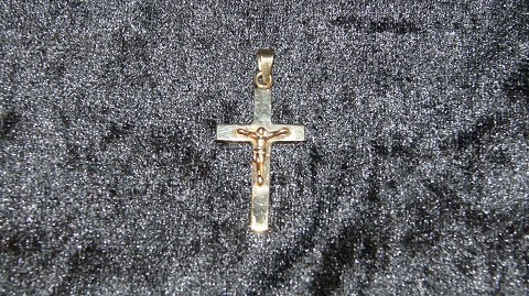 Kors i 14 karat Guld
Stemplet CHR 585
Måler 41,81*19,74 mm