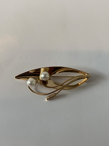 Elegant brooch in 14 carat gold
Stamped 585
Length 5 cm approx