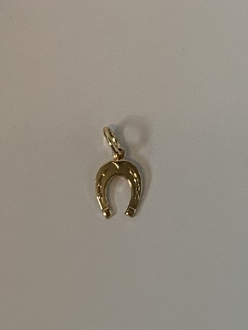 Horse shoe in 14 karat gold
Stamped Bh 585
Height 18.07 mm