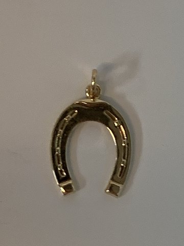 Horse shoe in 14 karat gold
Stamped 585
Height 26.03 mm