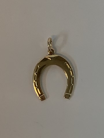 Horse shoe in 14 karat gold
Stamped 585 BH
Height 25.32 mm approx