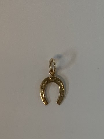 Horse shoe in 14 karat gold
Stamped 585 BH
Height 25.32 mm