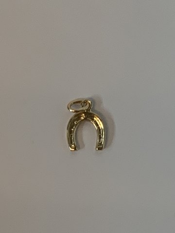 Horse shoe in 14 karat gold
Stamped 585
Height 15.91 mm