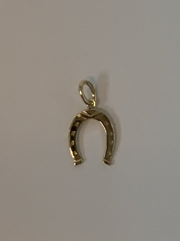 Horse shoe in 14 karat gold
Stamped 585
Height 16.91 mm