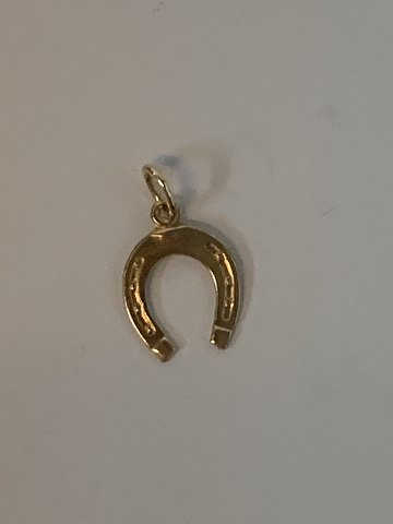 Horse shoe in 14 karat gold
Stamped 585
Height 17.82 mm approx
Thickness 0.80 mm