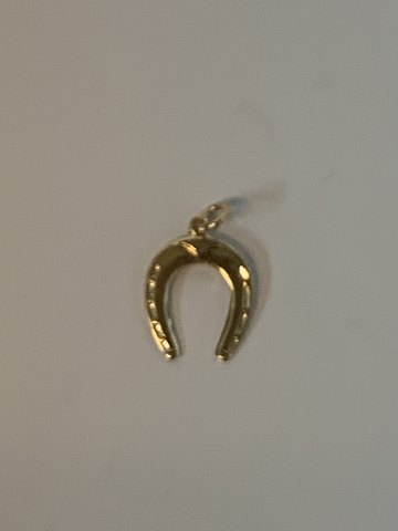 Horse shoe in 14 karat gold
Stamped 585
Height 16.98 mm
