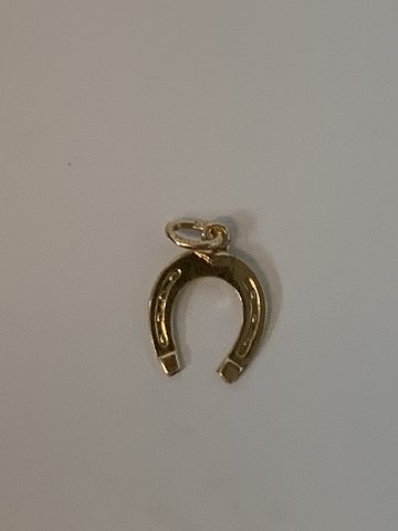 Horse shoe in 14 karat gold
Stamped 585
Height 19.12 mm