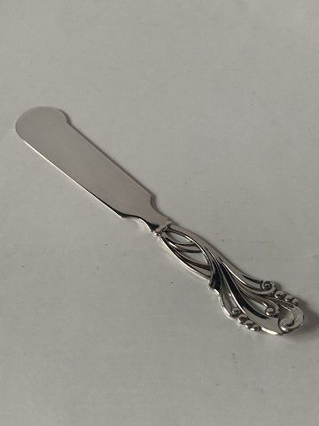 Smørkniv i sølv 
Stemplet 830S A.G 
Længde ca 14 cm