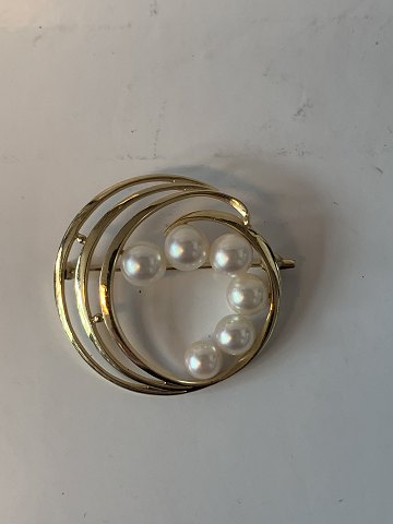 Magnificent and elegant brooch in 14 carat gold with pearls