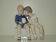 Bing & Grondahl Figurine
Boy and Girl on Bench
Dec. Number 2175
