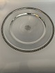 Svend Toxværd. Silver cover plate / Platter
Three-towered silver / 830s.
Diameter 27 cm