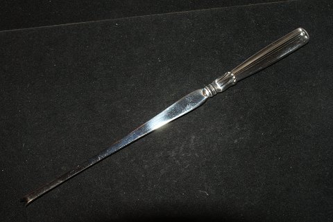 Hummergaffel Lotus Sølv
W & S Sørensen
Længde 19 cm.
SOLGT