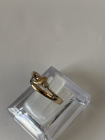Gold ring with zircon
and 14 carat goldinfo