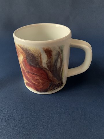 Royal Copenhagen faience, small vintage mug model number 495.
Height 7 cm.