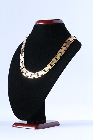 Block necklace in 14 carat gold, wide model with 3 rows without progression. 
Stamped WJ 585.