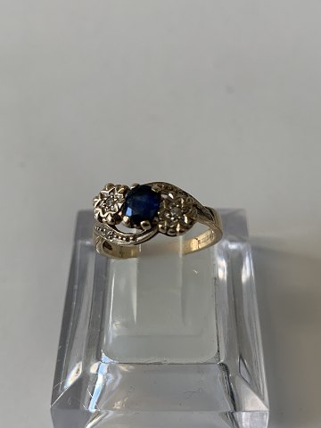 9 Karat Guldring med blå safir og brillanter
Størrelse 48