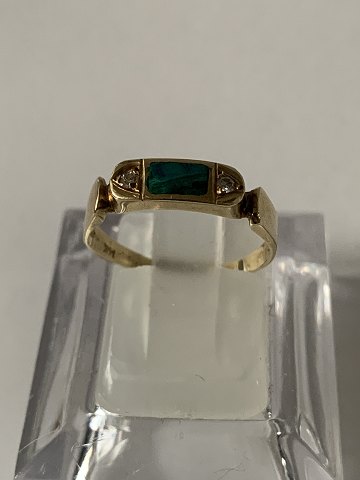 Gold ring with Malachite and diamonds 14 carat
Ring size 51