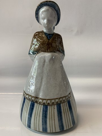 Bing & Grondahl stoneware figurine, Lady in traditional costume.