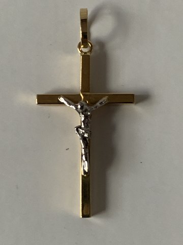 Guldkors i 18 karat rød- og hvidguld guld, og med flotte detaljer.