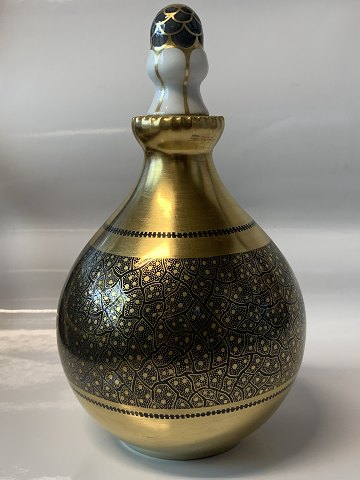 B&G Vase med prop, guld
Dek. Nr. 1080/69.