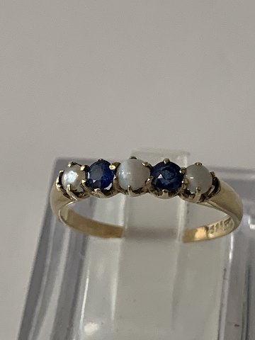 14 karat guld, Dame ring med blå sten og Perler.
Ring størrelse 58.