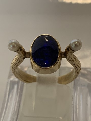 14 karat guld, Dame ring Blå sten & Perler.
Ring størrelse 52.
