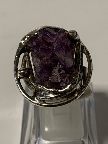 Ladies ring with raw amethysts.
Size. 63 One Size.
