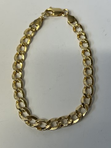 Facetslebet panserarmbånd i 14 karat guld, stemplet 585 Længde 17,5 cm.
