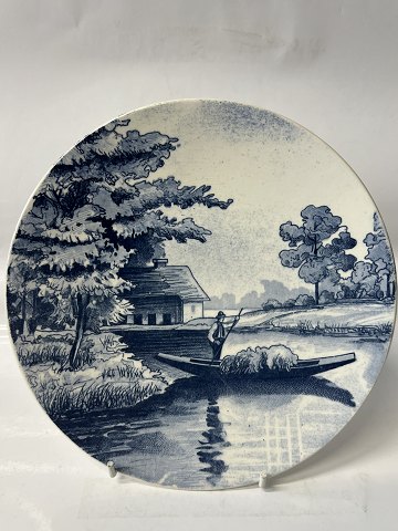 Villeroy & Boch, Platte Man in a boat loaded with hay. Ø. 20.0 cm.