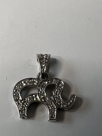 Elephant Pendant, in 14 Kt. white gold with inlaid diamonds.Height 1.7 cm.