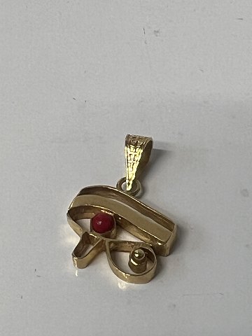 Eye of Horus, with red coral Pendant / Charms in 14 carat gold.Height 2.2 cm.