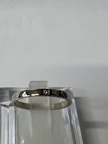 18 karat hvidguld, alliancering med en diamant.Størrelse 54.