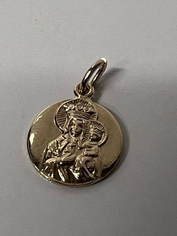 14k. Gold medallion featuring the Virgin Mary and the Christ Child with halos.Height: 1.6 cm.