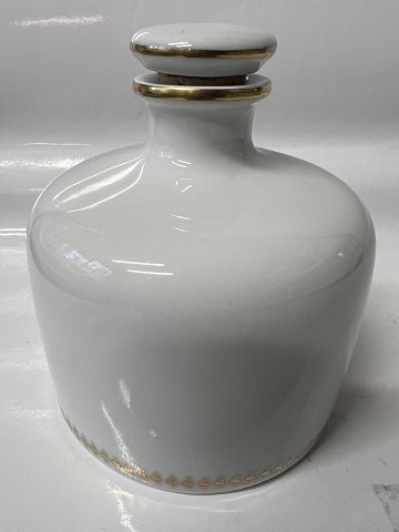 Irma Snaps / Bitter Flaske i Porcelæn fra Bing & Grøndahl.H 11,5 X Ø 10,5 cm.