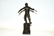 Bronze figure man from early stages of human