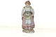 Meissen figurine, Woman holding a basket full of flowers.