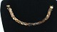 Gold Bracelet, 18 Karat
Stamp: 750, 21SV1
Length 18.5 cm.