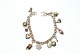 Anchor chain bracelet with charms, 14 Carat Gold
SOLD