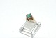 Elegant ladies ring with green stone 14 carat gold