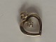 Heart with Zircon Pendant #14 carat Gold
Stamped 585
Height 14.50 mm
Width 11.66 mm