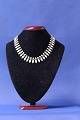 Volmer Bahner necklace of gold-plated silver & white enamel
Length: 38.5 cm