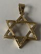 Star of David pendant in 14 Karat gold.