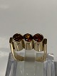 14 karat guld, Dame ring med 3 Orange stene.
Ring størrelse 52.