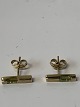 Gold earrings in 8 carat gold, inlaid bright green stone.