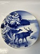 Deer among trees in winter.Ø 20,0 cm.